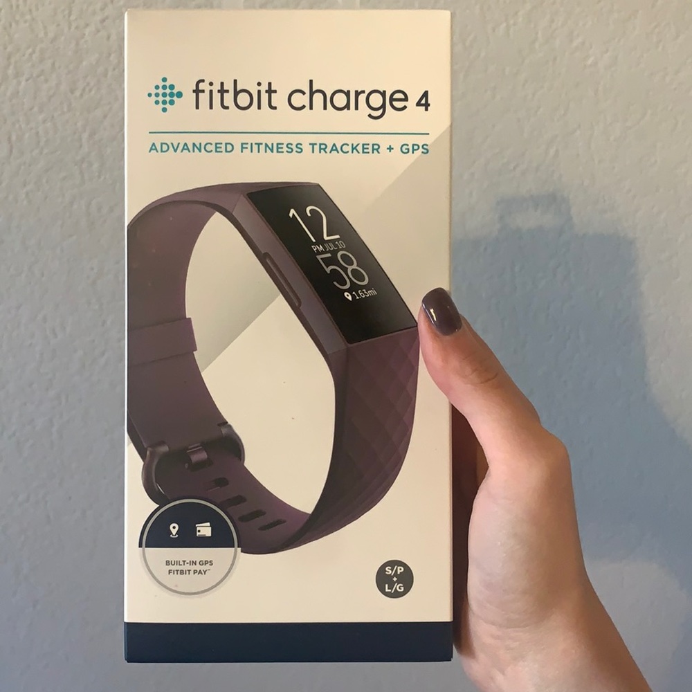 Brand new Fitbit Charge 4 in Rosewood. Two band sizes - small and large.
